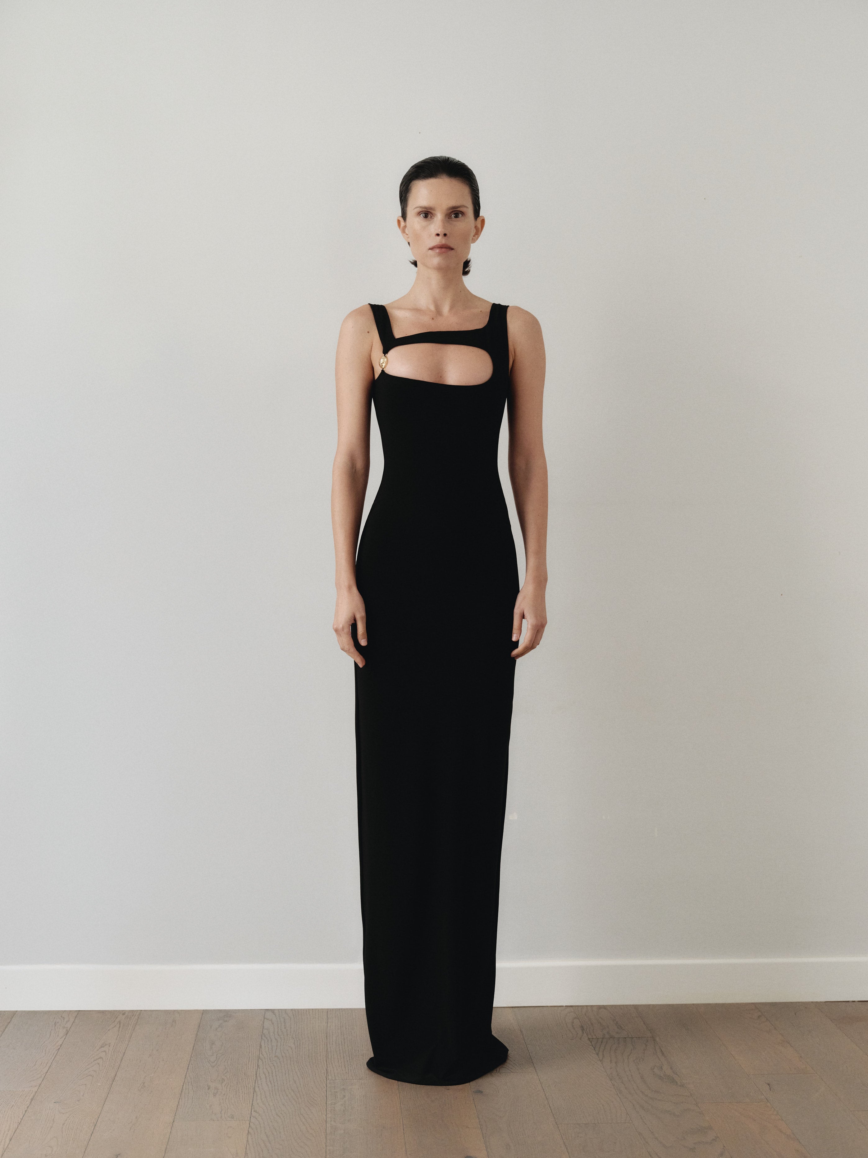 Black Maxi Cut Out Dress with Hand-Made Gold Pleated Stone Accesory