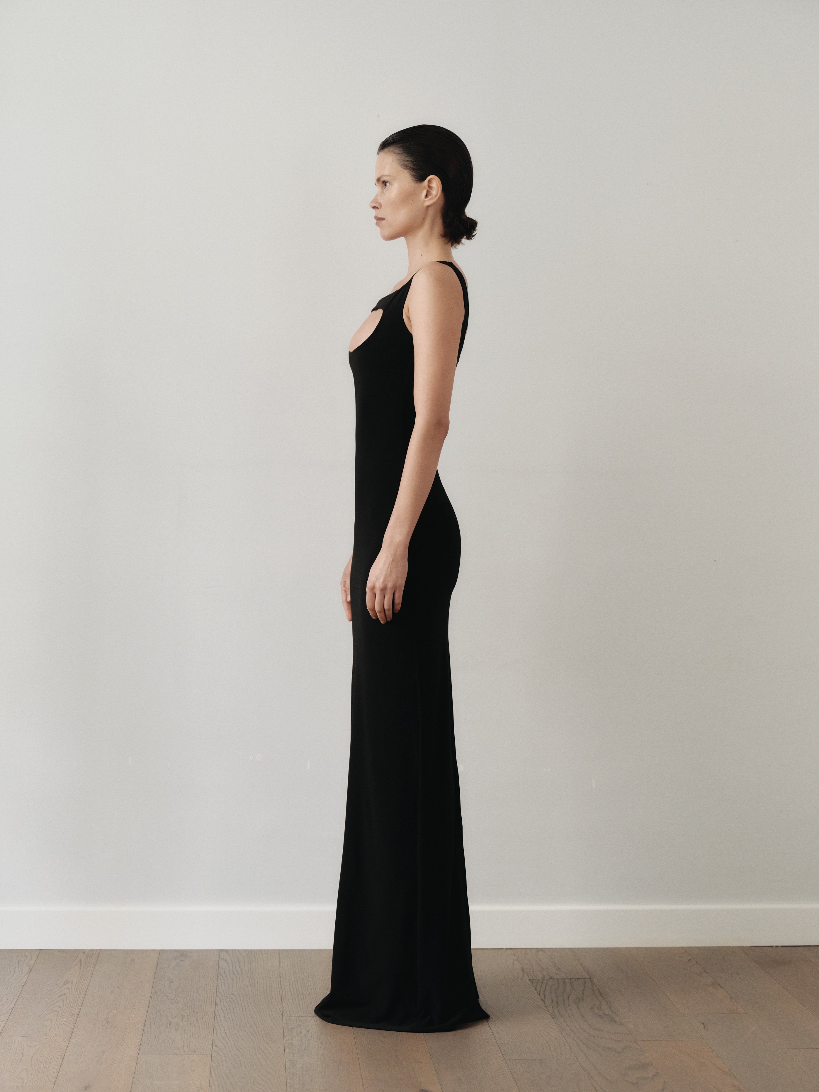 Black Maxi Cut Out Dress with Hand-Made Gold Pleated Stone Accesory