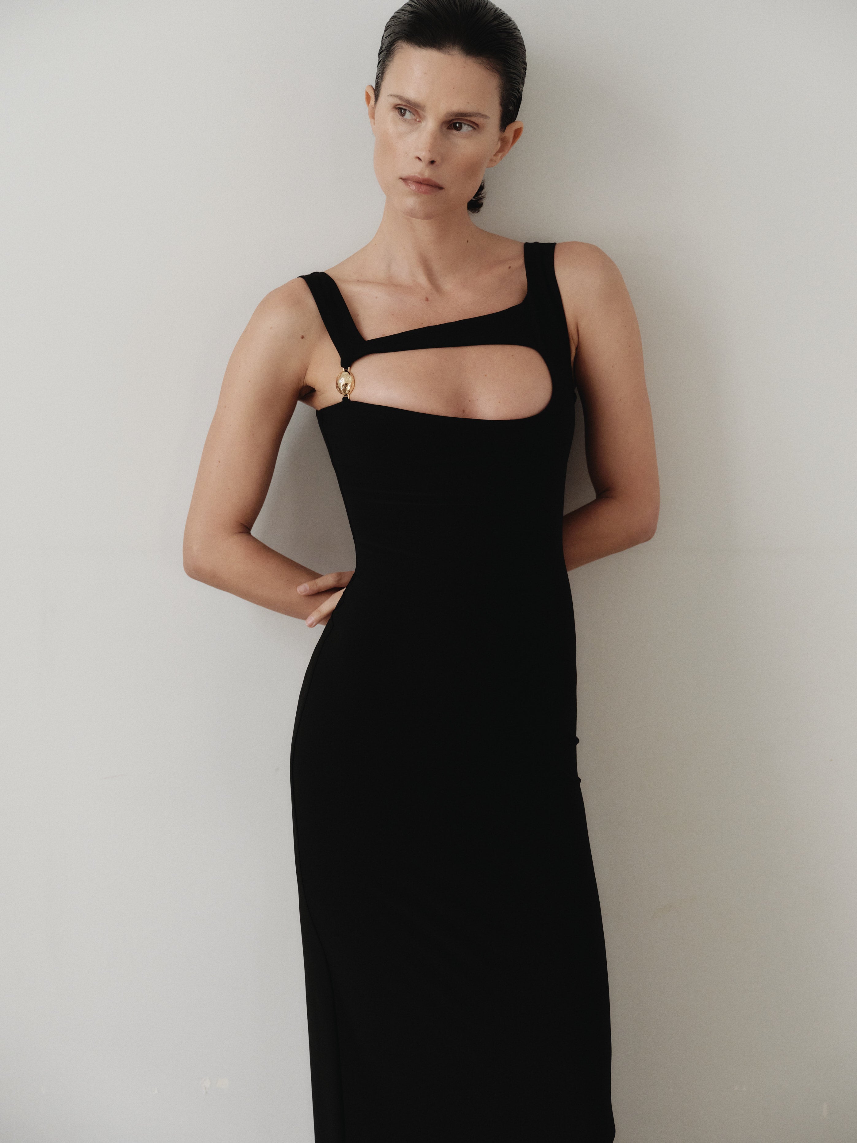 Black Maxi Cut Out Dress with Hand-Made Gold Pleated Stone Accesory